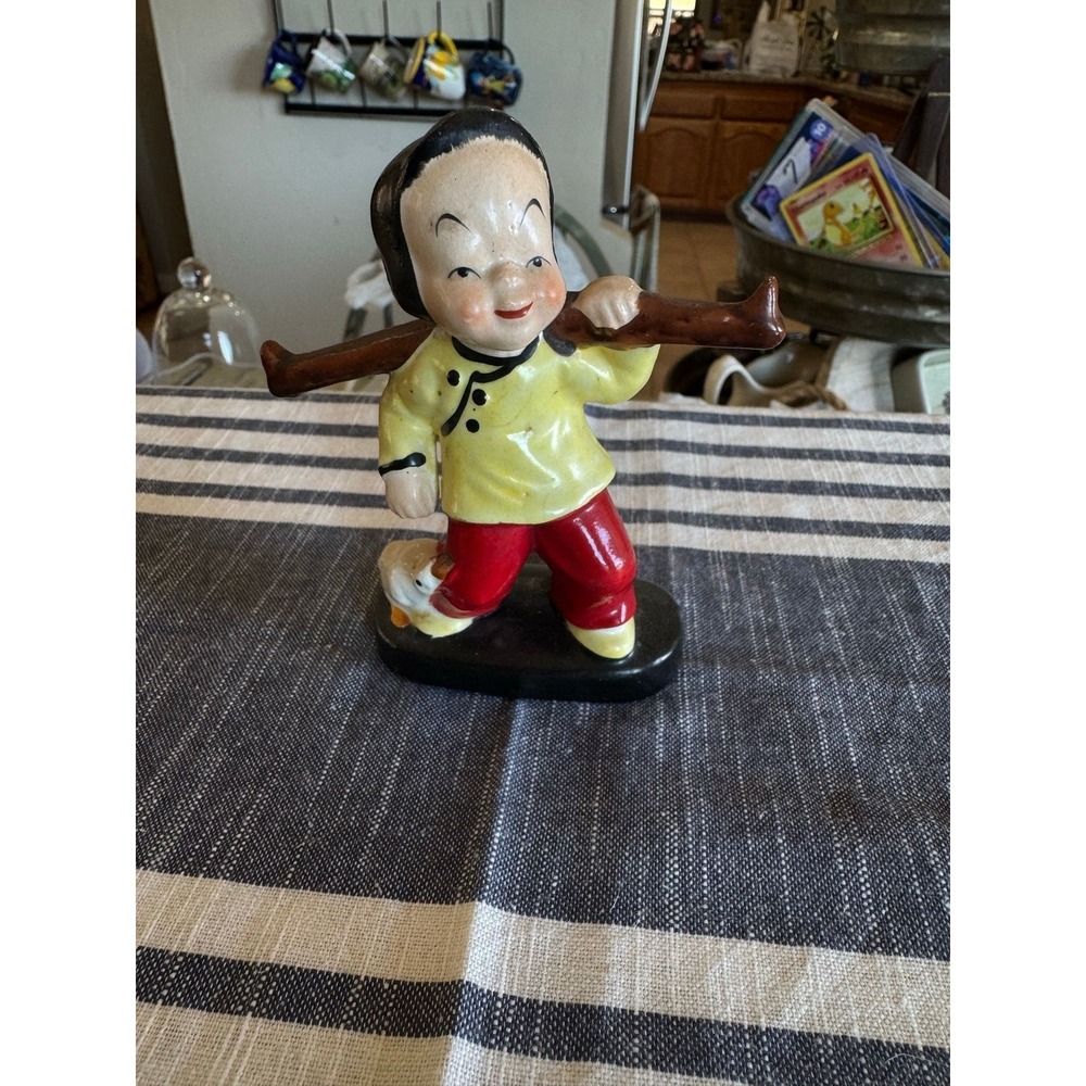 vintage Occupied Japan Japanese porcelain figurine of a boy with a duck